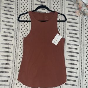 Nike Dri Fit Tank for Women in size Medium. Burnt Orange color. NWT